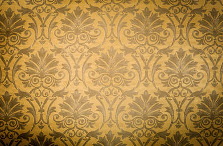 cool retro floral wallpaper in tan and brown designの写真素材
