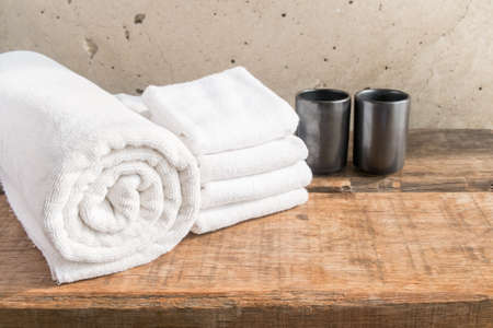 Stacked white spa towelsの写真素材