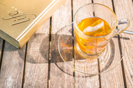 Cup of tea on a wooden backgroundの写真素材