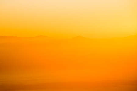 sun rise over a fog and mountain  in Thailand