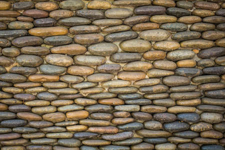 Background of stone wall texture photoの写真素材