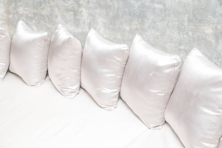 White pillows on sofa close upの写真素材