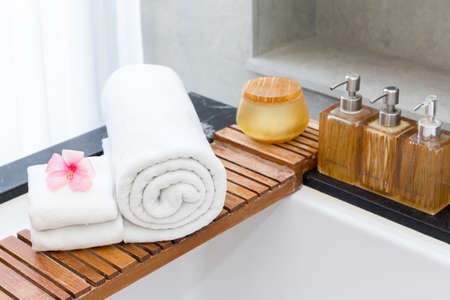 Clean white towel on a hanger prepared to use.の写真素材