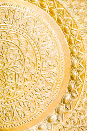 Close up of a golden metal copper bronze texture.の写真素材