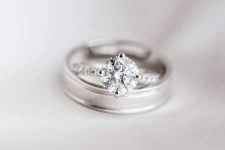 Wedding diamond rings on the black backgroundの写真素材
