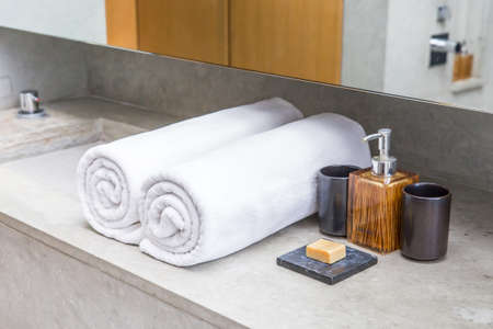 Stacked white spa towelsの写真素材