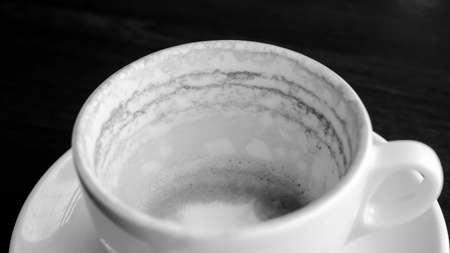 Stock Photo:
Empty coffee cup on wooden tableの写真素材