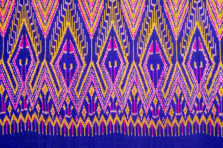 Colorful thai silk handcraft peruvian style rug surface close up More this motif & more textiles peruvian stripe beautiful background tapestry persian nomad detail pattern farabic fashionable textile.の写真素材