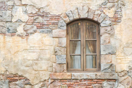 classic window on the brick wallの写真素材