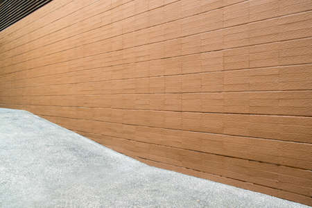 A brown tile wall