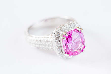 Ring of the jewelry with pink sapphire isolated on white backgroundの写真素材