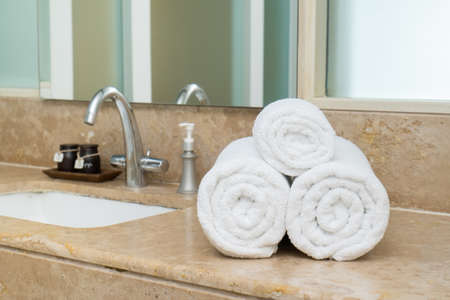 Stacked white spa towelsの写真素材
