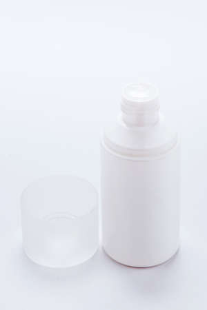 White cosmetics containers, bottle with packageの写真素材