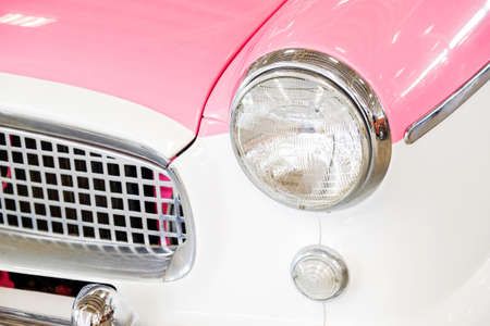 Selective focus point on Headlight lamp car - vintage filterの写真素材