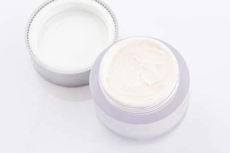 cosmetic cream in container isolated on white background