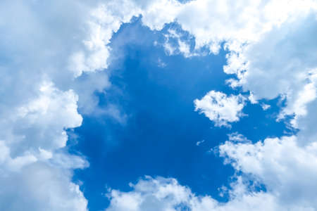 Blue sky with clouds for backgroundの写真素材