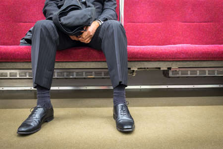 businessman sitting on the train