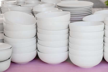 Stack of white ceramics plate and bowl
