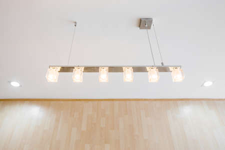 modern lamp hanging in office roomの写真素材