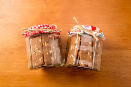 Cookie in bottle for gift on wooden backgroundの写真素材