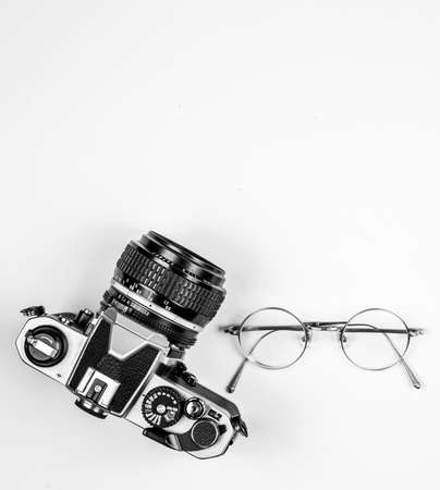 Vintage camera on white wooden backgroundの写真素材