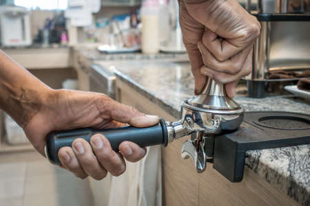 process to making coffee. barista making coffee through the devices of the coffee machineの写真素材