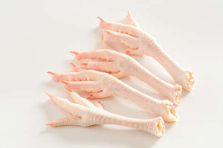 Chicken feet on white backgroundの写真素材