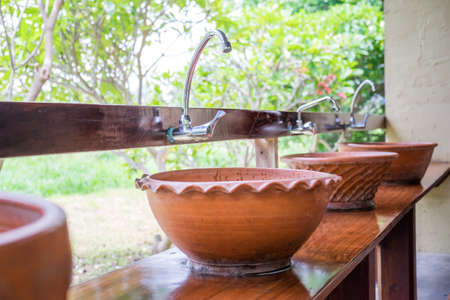 Hand washing basin  in restroom public , Thai styleの写真素材
