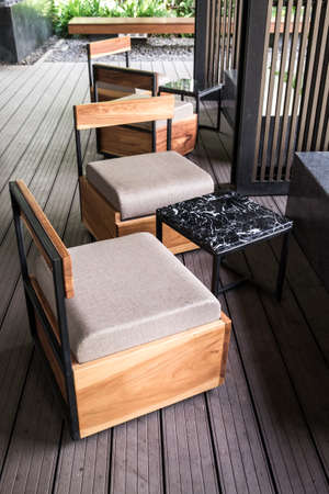 Modern cafe interior with small table and chair