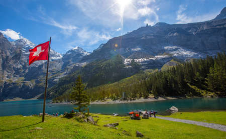 The panorama in summer view over the Oeschinensee (Oeschinen lake)の写真素材