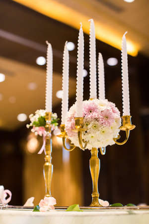 Wedding candlestick with flower decorationの写真素材
