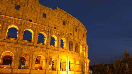 Colosseum in Rome at twilight , Italy
