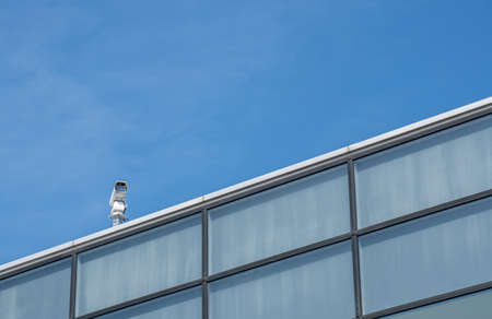 Security Camera CCTV on buildingの写真素材