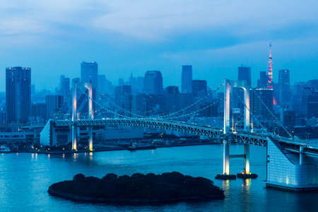 Tokyo Tower skyline and Rainbow Bridge with cityscape at Odaiba Japanの写真素材