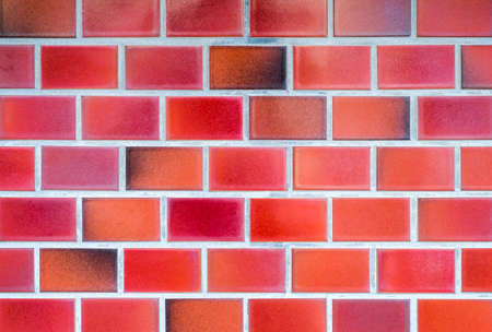 Red ceramic floor tiles closeup texture