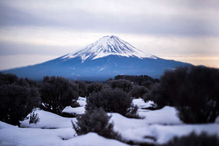 Selective focus point Mountain Fuji at Kawaguchiko lake at sunset in winterの写真素材