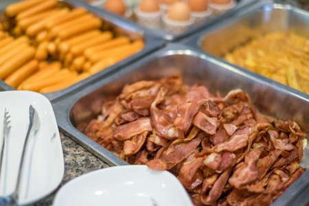 Bacon and sausage for yummy breakfastの写真素材