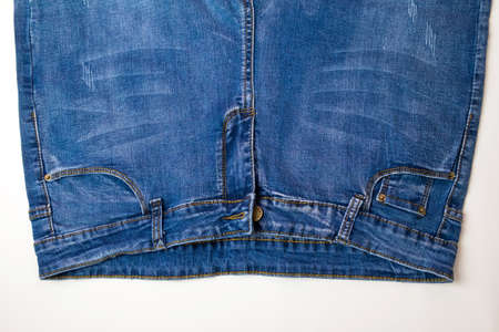Pair of jeans.White background on which lie two pairs of jeans.