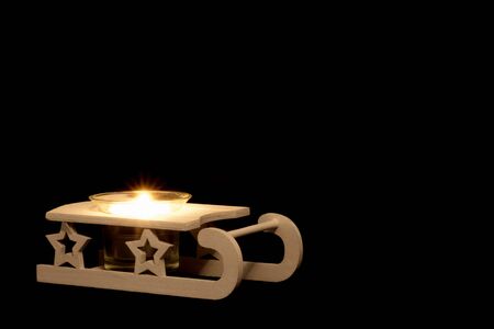 Sleigh with candleの写真素材