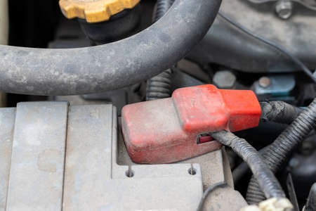 Car battery terminal. Detail of a flat-four (boxer) car engine compartment under the open hood. Closeup viewの写真素材
