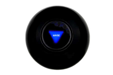 Magic 8 ball with prediction MAYBE isolated on white backgroundの写真素材