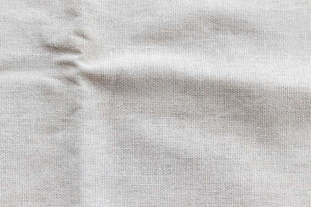 Natural linen fabric texture. Rough crumpled burlap backgroundの写真素材