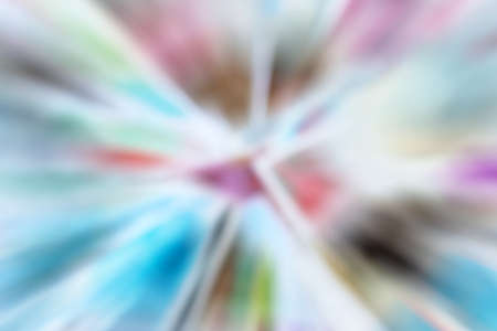 Circular geometric multicolor blurred gradient background. Abstract colorful explosion effect. Centric motion pattern. Mixed texture. Color burstの写真素材