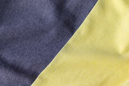 Jersey cotton fabric texture. Crumpled gray and yellow textile backgroundの写真素材