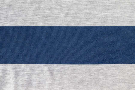Cotton jersey striped fabric with pills texture. Blue and gray textile backgroundの写真素材