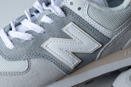 New Balance 574 light gray sneakers closeup. Suede and mesh walking, casual sport shoes. Illustrative editorial photo. Kyiv, Ukraine - September 7, 2020のeditorial素材