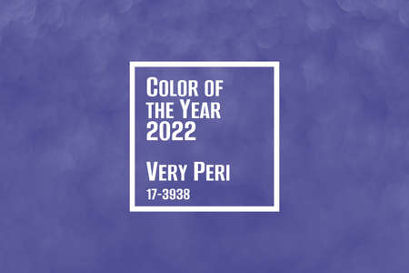 Trendy very peri color concept of the year 2022, violet blue sparkling glitter bokeh background, christmas abstract defocused texture. Holiday lightsの写真素材