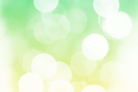 Summer green sparkling glitter bokeh background, abstract defocused lights texture