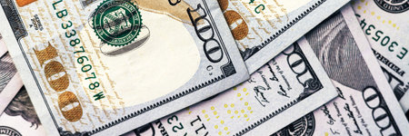 American paper dollar bills background. Hundred dollar banknotes texture, currency concept banner....