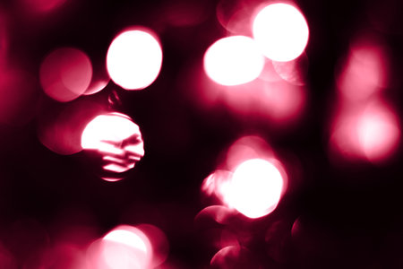 Viva magenta blurred lights abstract background. Holiday defocused bokehの写真素材